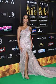 Celebrity poses to paparazzi at green carpet of IIFA awards 2022 in Abu Dhabi