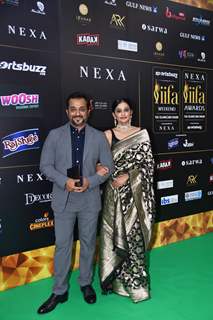 Priyamani with husband Mustafa Raj poses to paparazzi at green carpet of IIFA awards 2022 in Abu Dhabi