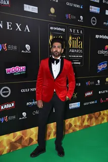 Vishal Kotian poses to paparazzi at green carpet of IIFA awards 2022 in Abu Dhabi