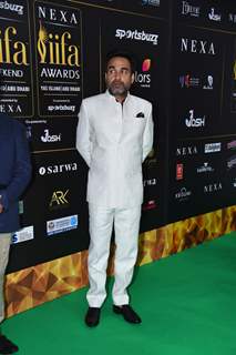 Pankaj Tripathi poses to paparazzi at green carpet of IIFA awards 2022 in Abu Dhabi