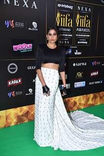 Sai Tamhankar poses to paparazzi at green carpet of IIFA awards 2022 in Abu Dhabi