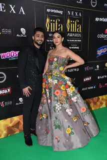 Gauahar Khan and Zaid Darbar poses to paparazzi at green carpet of IIFA awards 2022 in Abu Dhabi