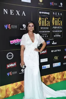 Celebrity poses to paparazzi at green carpet of IIFA awards 2022 in Abu Dhabi