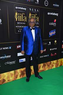Boney Kapoor poses to paparazzi at green carpet of IIFA awards 2022 in Abu Dhabi