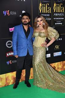 Rakhi Sawant and her boyfriend Adil Khan poses to paparazzi at green carpet of IIFA awards 2022 in Abu Dhabi
