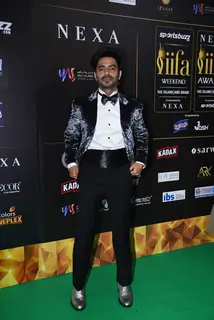 Aparshakti Khurana poses to paparazzi at green carpet of IIFA awards 2022 in Abu Dhabi