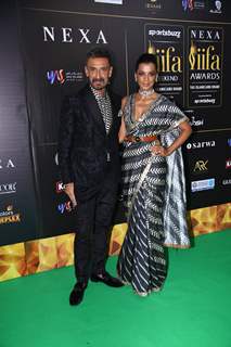 Rahul Dev and Mugdha Godse poses to paparazzi at green carpet of IIFA awards 2022 in Abu Dhabi