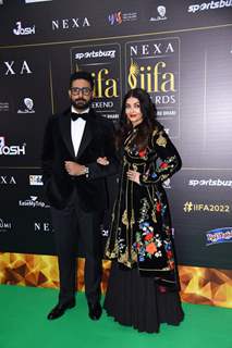 Abhishek Bachchan and Aishwarya Rai Bachchan poses to paparazzi at green carpet of IIFA awards 2022 in Abu Dhabi
