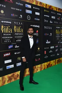 Vicky Kaushal poses to paparazzi at green carpet of IIFA awards 2022 in Abu Dhabi