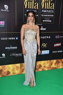 Sanya Malhotra poses to paparazzi at green carpet of IIFA awards 2022 in Abu Dhabi