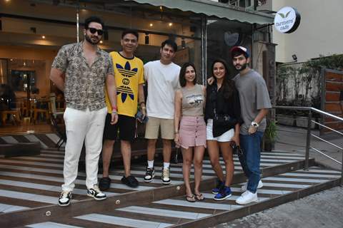 Aly Goni, Jasmin Bhasin poses with their friends outside the Farmas cafe at Bandra