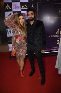 Rakhi Sawant poses with Adil Khan clicked at The International Iconic Awards 2022
