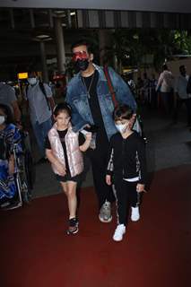 Karan Johar spotted with his kids at the Mumbai airport