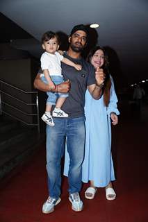 Mohit Malik, Addite Shirwaikar Malik poses with son at the Mumbai airport