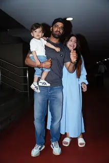 Mohit Malik, Addite Shirwaikar Malik poses with son at the Mumbai airport