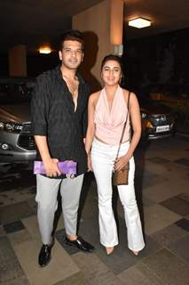 Tejasswi Prakash spotted in a baby pink halter neck top and white pants. Karan Kundrra wore a short black kurta and grey pants