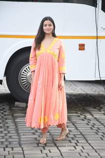 Mum-to-be Alia Bhatt looked radiant in an orange and yellow ethnic wear as she was clicked at the airport