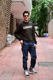 Vijay Varma clicked during the promotions of Darlings in a camouflage t-shirt and denims