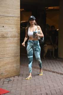 Malaika Arora looked fit and fabulous as she was spotted today in a bralette, printed leggings and a cap