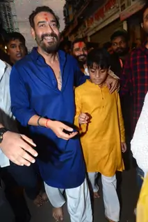 Ajay devgn spotted with son Yug devgn at Lalbaugcha Raja 
