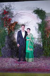 Hrithik Roshan looked handsome in a black suit with girlfriend Saba Azad in a green sharara set at Ali and Richa's wedding reception