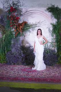 Kritik Kharbanda defining gorgeous in a white ruffled saree at Richa and Ali's wedding reception