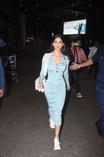 Suhana Khan kept her airport look on point in a powder blue bodycon dress