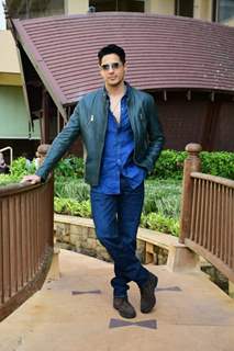 Sidharth Malhotra is a handsome hunk in a blue denim shirt and leather jacket