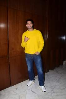 Siddhant Chaturvedi clicked during the promotions of Phone Bhoot in a yellow sweat shirt and denims