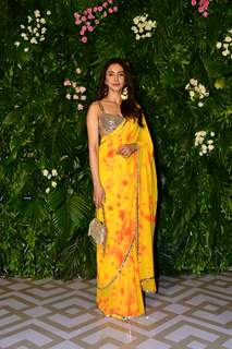 Rakul Preet arrives for Kriti Sanon’s Diwali bash in a yellow tie dye saree and a golden blouse.