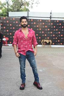 Varun Dhawan looked handsome in a floral pink shirt and denims