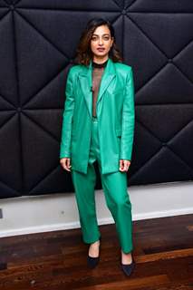 Radhika Apte gives boss babe vibes in a latex green pant suit while promoting her upcoming film Monica O My Darling