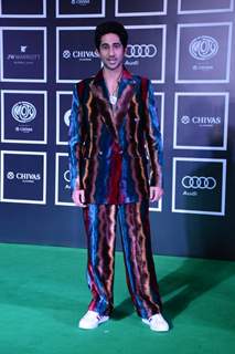 Ranveer Singh made heads turn with his usual fashion statements, in a non- formal suit with a dragon motif on the pants. Photo