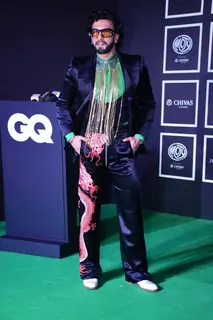 Ranveer Singh made heads turn with his usual fashion statements, in a non-formal suit with a dragon motif on the pants.