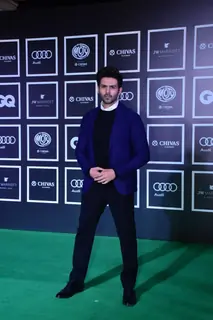 Kartik Aaryan kept it stylish in a black sweater and black pants paired with a blue blazer.
