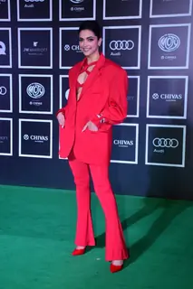 Deepika Padukone makes a powerful statement in a red pant suit at the GQ Men Of The Year Awards 2022