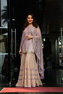 Madhuri Dixit looks graceful and elegant in an ethnic sharara set paired with a poncho