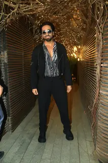 Ayushmann Khurrana wore a printed shirt, a black jacket and matching baggy pants for Kartik Aaryan's birthday bash