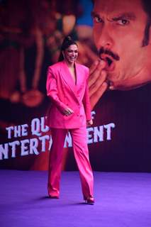 Deepika Padukone looks electrifying in a hot pink, oversized blazer, matching trousers and pumps at the launch of the song #CurrentLaga