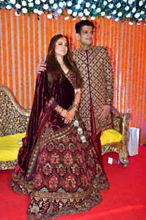 Rrahul Kanal poses with his wife 