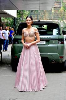 Ananya Panday arrives for Alanna Panday's mehendi in a pleated lehenga skirt and metallic pink bralette