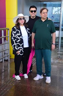 David Dhawan and his wife snapped at the Goa airport to attend Rakul Preet and Jackky Baghnani's wedding