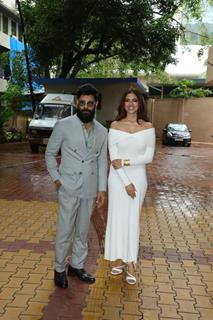 Malavika Mohanan and Chiyaan Vikram snapped promoting film Thangalaan in Mumbai