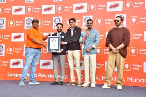 Ajay Devgn and Rohit Shetty attempt the Guinness World Record for the largest Vada Pav delivery at Airport High School & Junior College