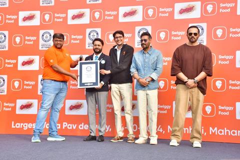 Ajay Devgn and Rohit Shetty attempt the Guinness World Record for the largest Vada Pav delivery at Airport High School & Junior College