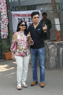 Anand Pandit cast their votes in Mumbai