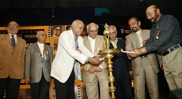 Celebrities lighting the lamp at the MAMI (Mumbai Academy of the Moving Image) film festival This year the festival will be dedicated to Hrishikesh Mukherjee In all, 125 films will be screened from 40 countries with special focus on South Africa