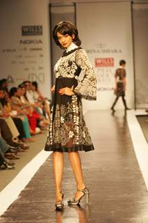 A model display the collection of Rina Dhaka at Lakme Fashion Week in Mumbai