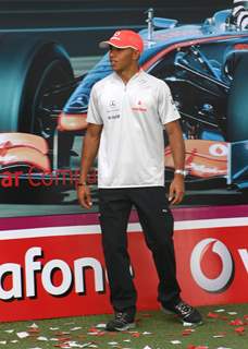 Formula One World Champion Lewis Hamilton Enthralled hundreds of his fans in Delhi by playing the Cricket, on a promotional tour for Vodafone Essar, in New Delhi on Saturday