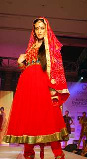 Glam siblings Riya Sen walking the ramp at COKUSS Kolkata Fashion File show on Tuesday Evening 4th Aug 09